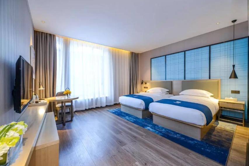 Echarm Hotel Ji'Nan Railway Station Jinan Exterior photo